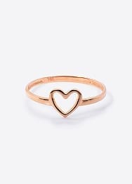 a rose gold ring with a hollow heart in the center