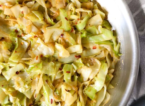 Overhead view of sauteed cabbage in a bowl