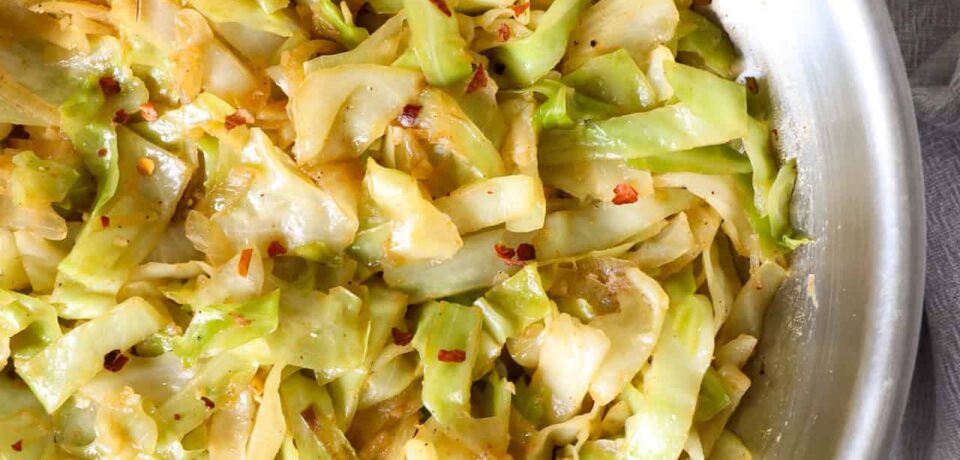Overhead view of sauteed cabbage in a bowl