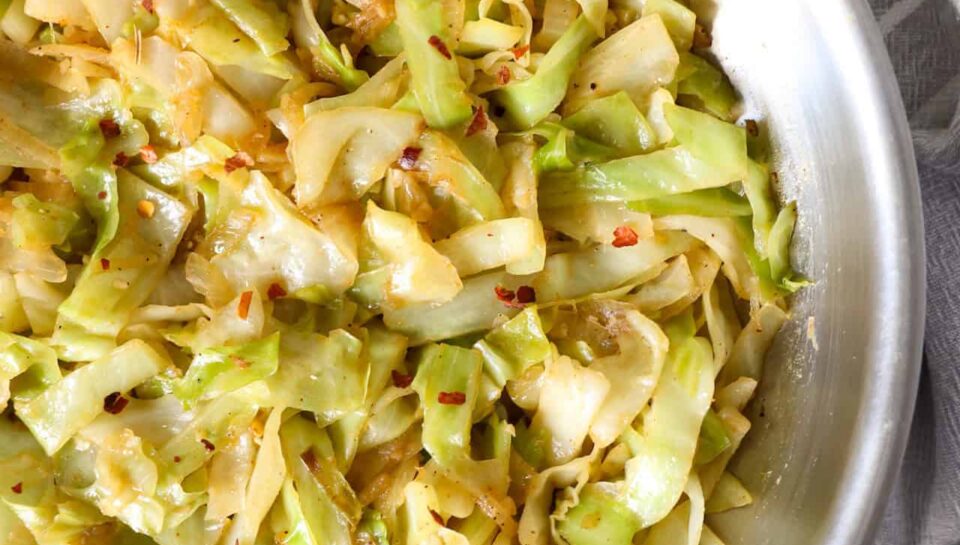 Overhead view of sauteed cabbage in a bowl